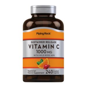 Flacone marrone di integratore Vitamina C 1000 mg Piping Rock a rilascio prolungato con rosa canina, contenente 240 compresse rivestite vegetariane.